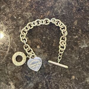 Authentic classic sterling Silver toggle tag Tiffany bracelet. Tiffany pouch inc